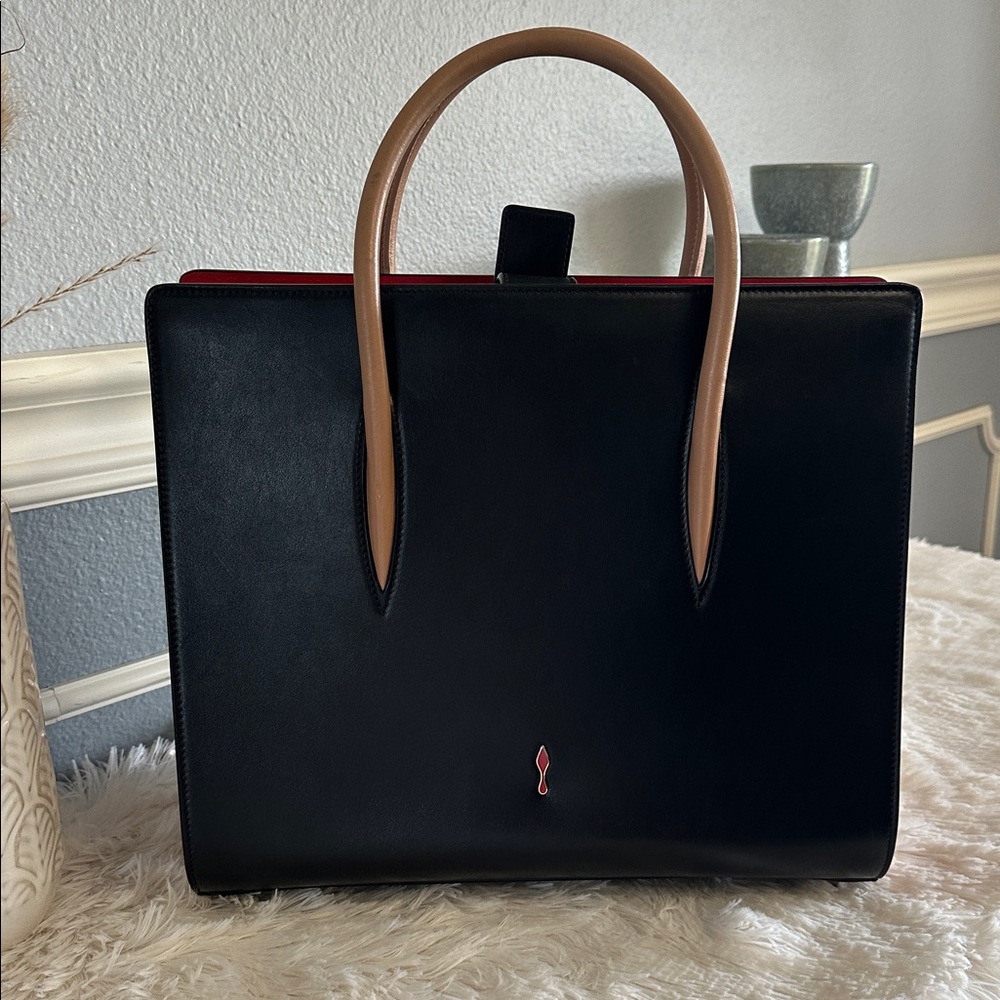 Christian Louboutin Paloma top handle tote
Med size with animal print gussets